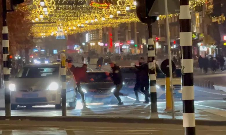 Israeli fans and pro-Palestinian protesters clash after a football match in Amsterdam